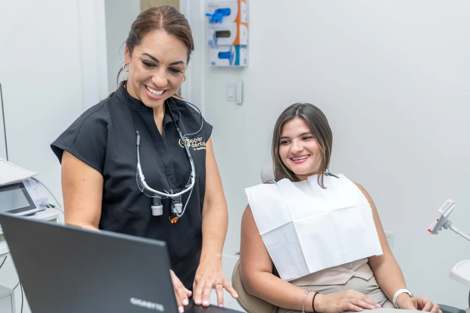 Upper Dental doctor consulting patient